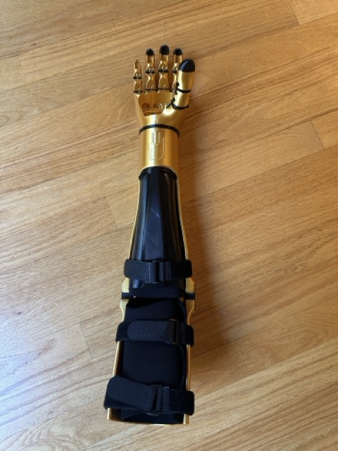 Kinetic Arm, front view, fully assembled with straps