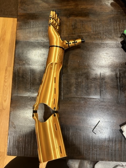 Kinetic Arm assembled on work table, before straps added