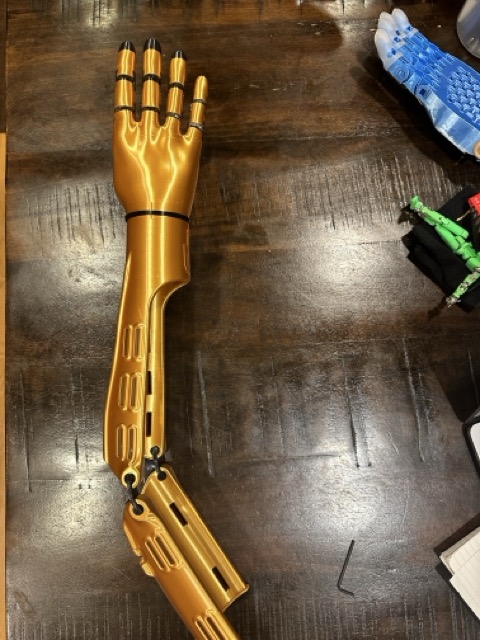 Kinetic Arm, alternate view on work table, wrist mechanism visible