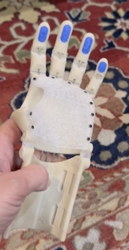 The thumbless Kinetic Hand, palm view with velcro lining